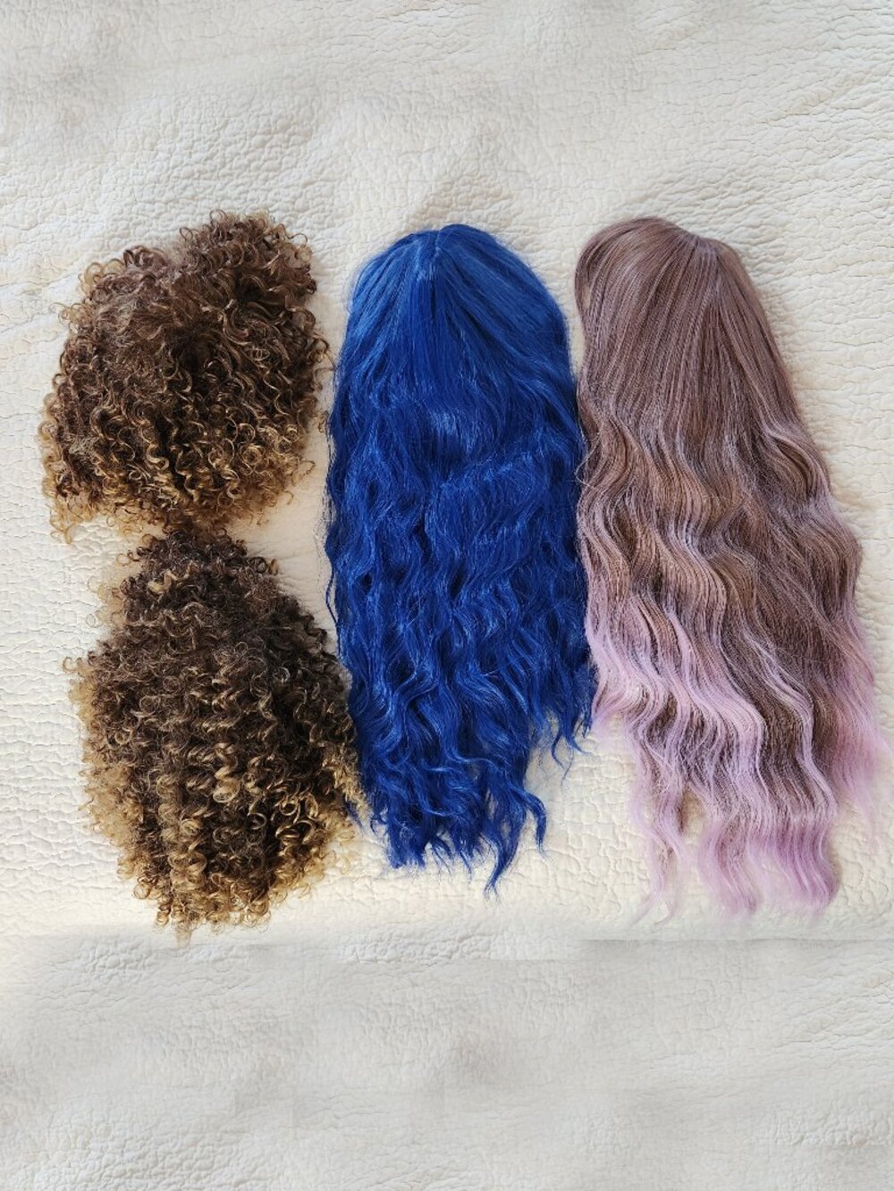 Bundle of Four Synthetic Wigs Two Long and Wavy Two Short and Curly